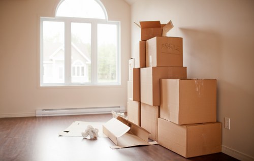 Packed business items organised for transport during a Merton move
