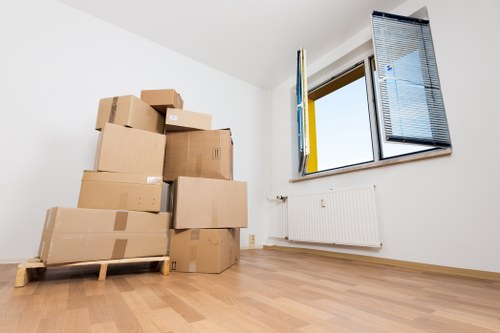 Removal company team reviewing anti-slavery compliance documents